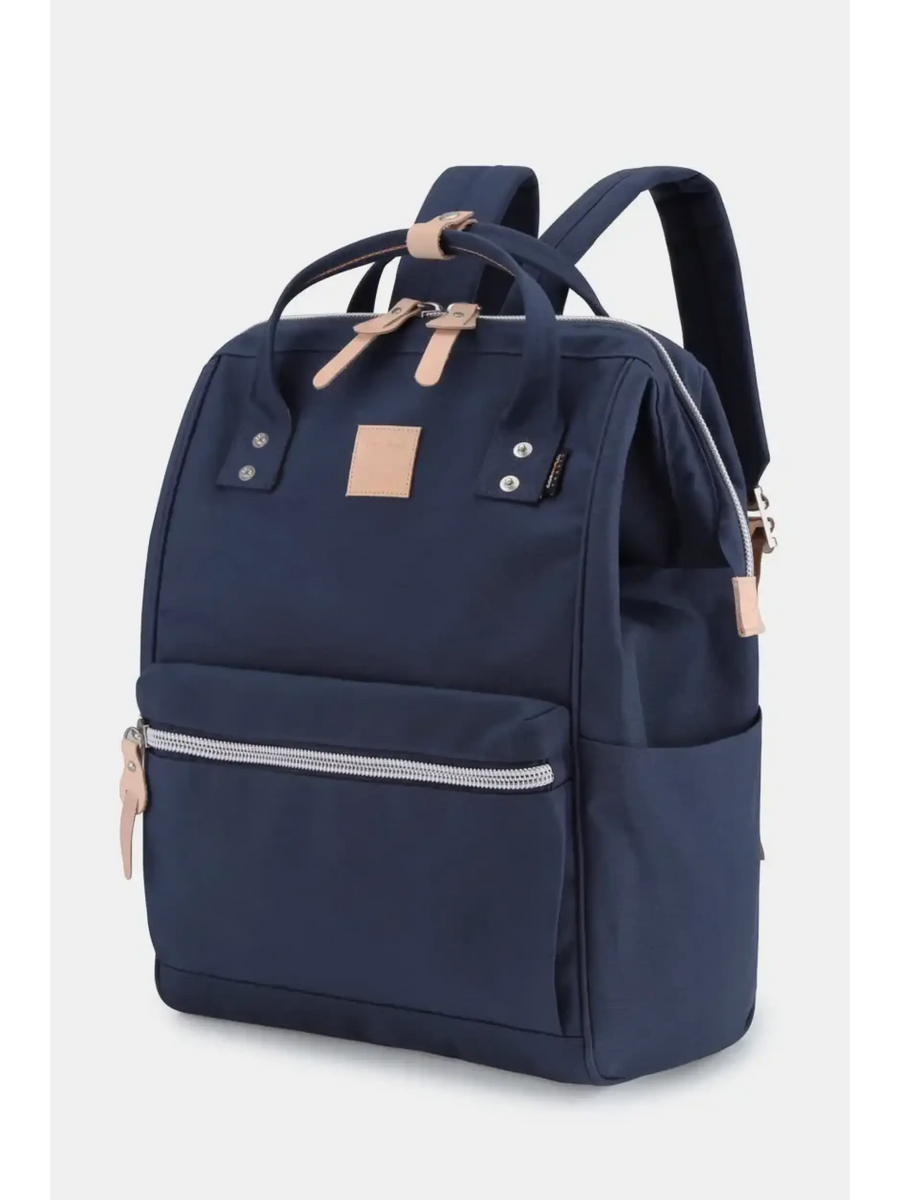 Navy Babe Beachwaer himawari durable backpack with front zipper pocket and tan leather accents