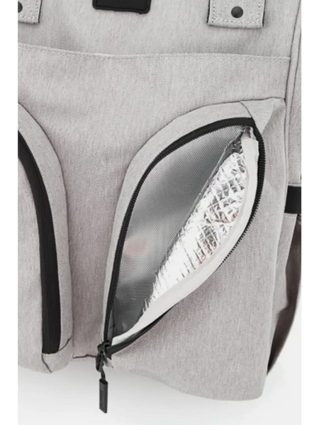 Close-up of beige large capacity waterproof back pack Himawari by Babe Beachwaer showing insulated zippered pocket