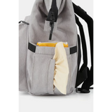 Gray Babe Beachwaer large capacity waterproof back pack Himawari with side pocket holding a yellow and beige item