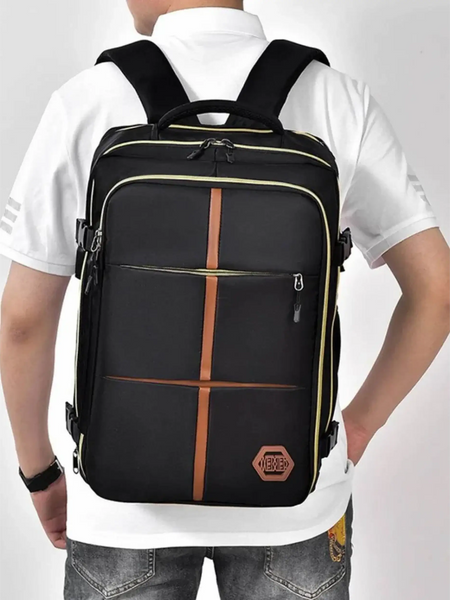 Himawari Lightweight Carry-On Backpack by Babe Beachwaer in black with brown accents worn by person