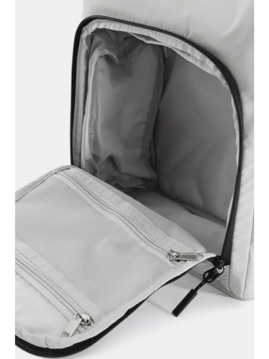Interior view of Himawari Nylon Top-Open Backpack showing zippered mesh compartments and spacious storage