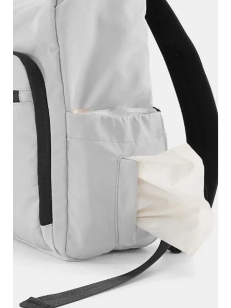 Close-up of Babe Beachwaer Himawari Nylon Top-Open Backpack side pocket with tissue dispenser and black strap