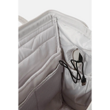Interior view of Himawari stylish summer backpack for women showing padded compartments and USB charging port cable