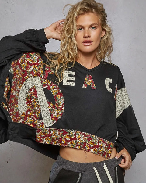 Black cropped sweatshirt with floral peace sign from Rock the Bloom collection