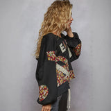 Black patchwork blouse from Rock the Bloom trendy cropped sweatshirt with peace vibes