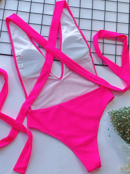 Hot Pink halter one piece swimsuit by Trendsi with deep V neckline and long straps