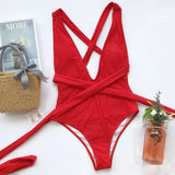 Trendsi hot pink halter one piece swimsuit with crisscross straps and wrap waist detail