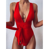 Trendsi hot pink halter one piece swimsuit with deep V neckline and waist tie detail