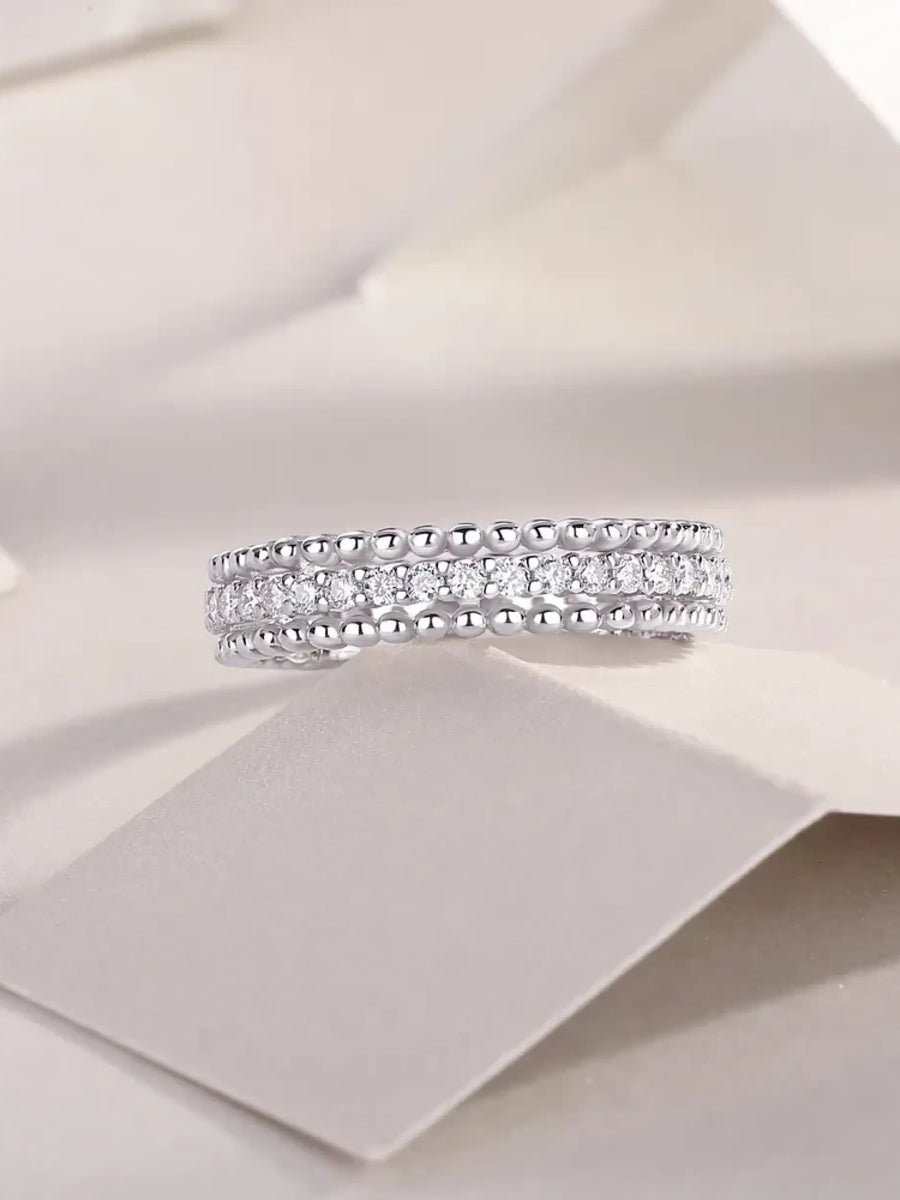 Babe Beachwear infinity Moissanite band ring with sparkling stones and silver beaded edges