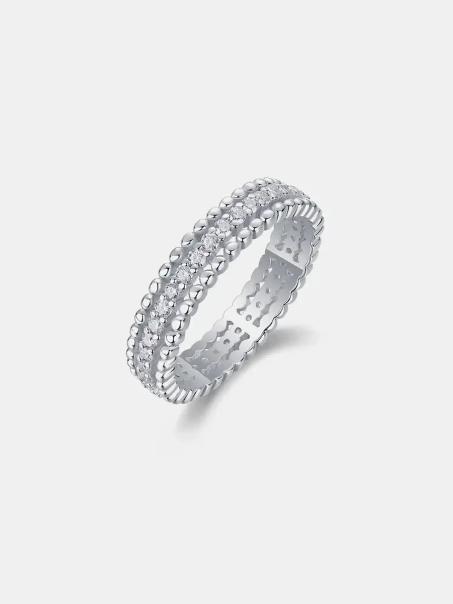Babe Beachwear infinity Moissanite band ring with sparkling stones and intricate beaded design