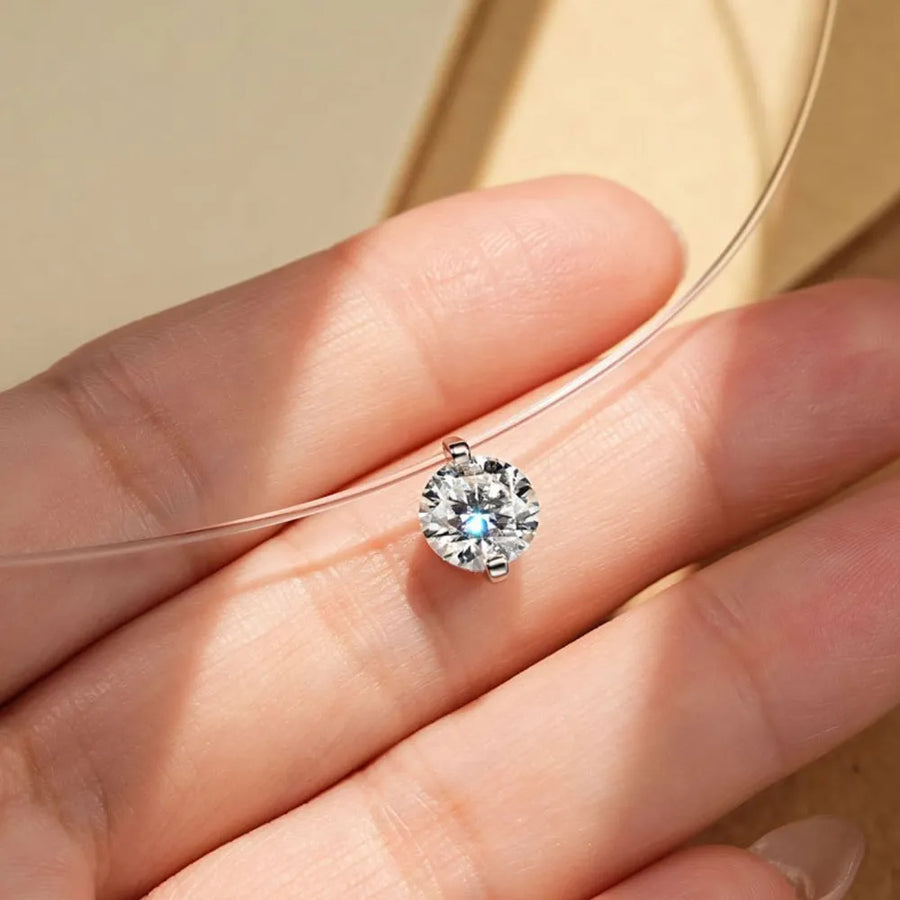 Trendsi necklace featuring an invisable 1 carat diamond on a clear wire chain