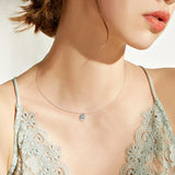 Trendsi necklace with invisable 1 carat diamond on clear string worn with lace top