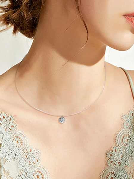 Trendsi necklace with invisable 1 carat diamond on clear string worn with lace top
