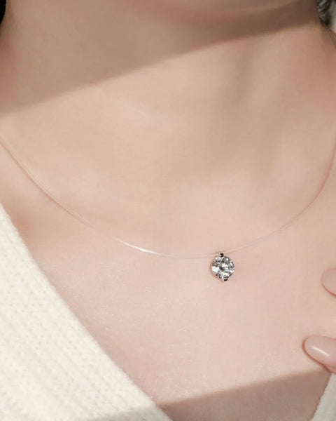 Trendsi necklace featuring an invisable 1 carat diamond pendant on a clear invisible chain