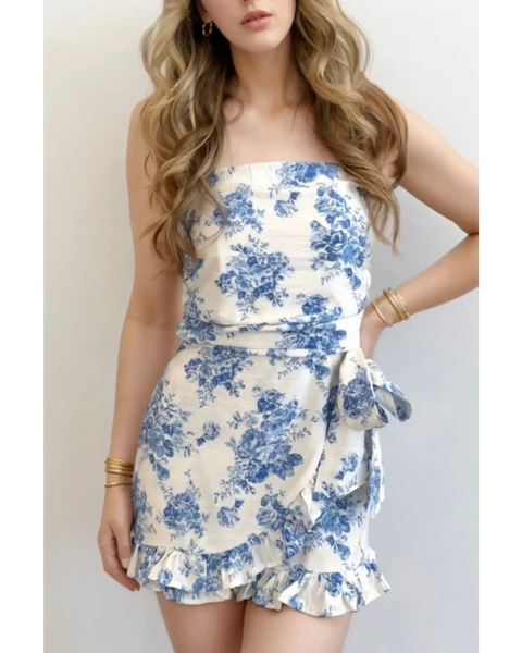 Trendsi junior size strapless ruffle hem romper with blue floral print and side bow detail