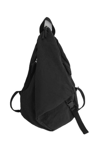 Black Babe Beachwear Kai Asymetric Canvas Backpack with single strap and buckle detail