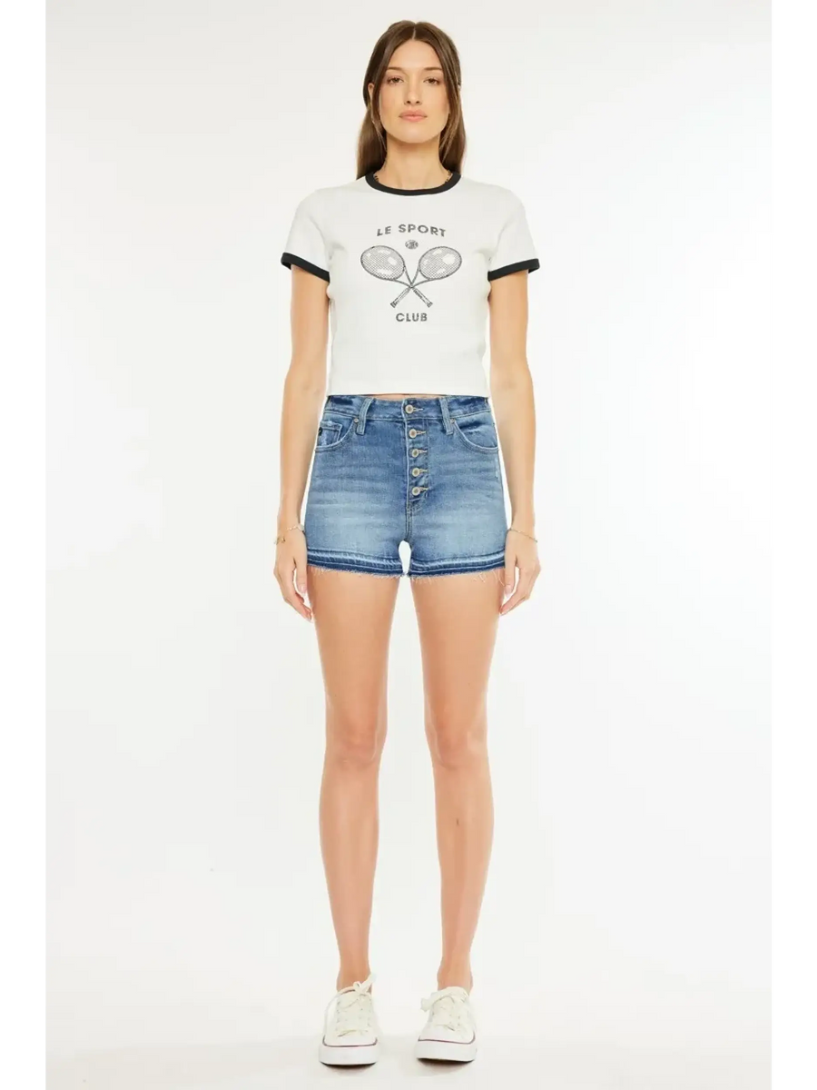 Trendsi kancan button fly cutoff shorts in blue denim worn with white graphic tee and sneakersk