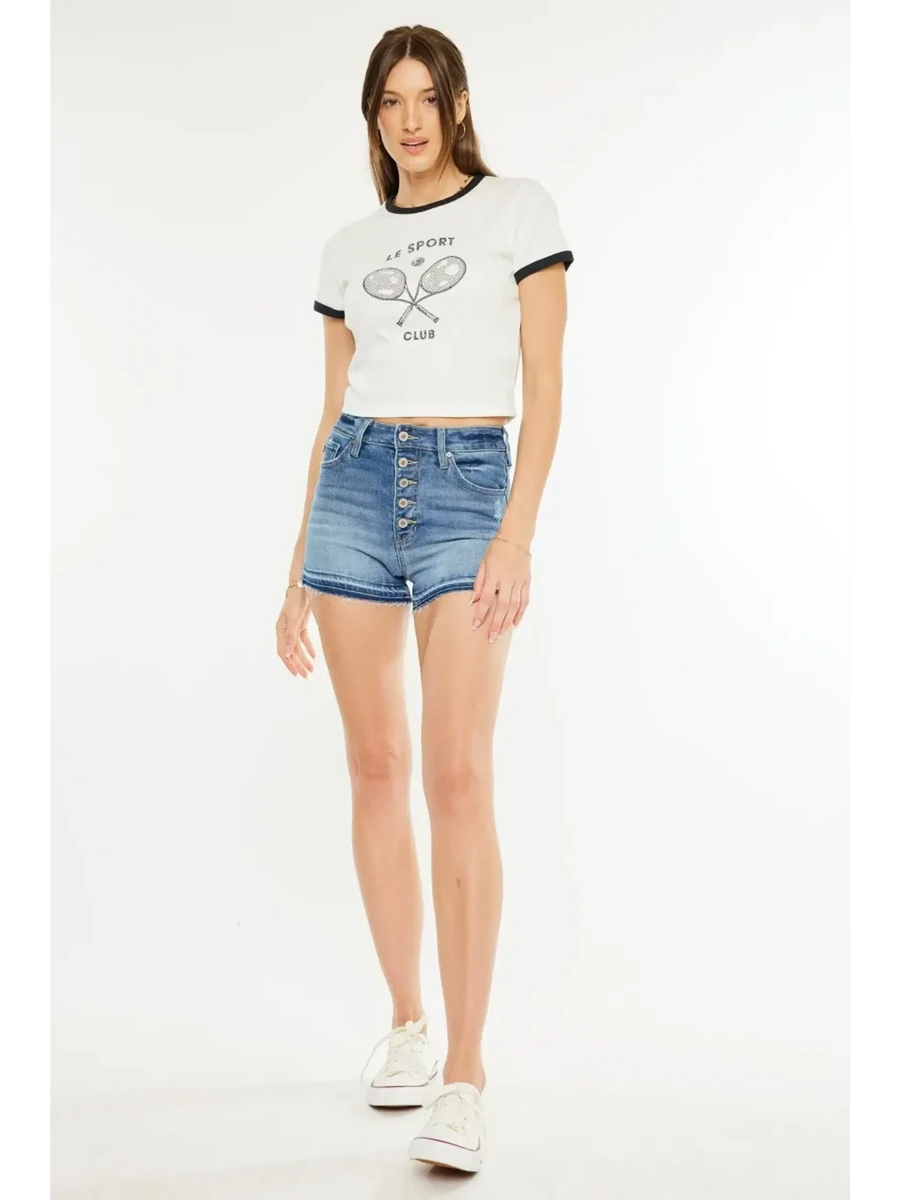Trendsi kancan button fly cutoff shorts in blue denim worn with white graphic crop top and white sneakers