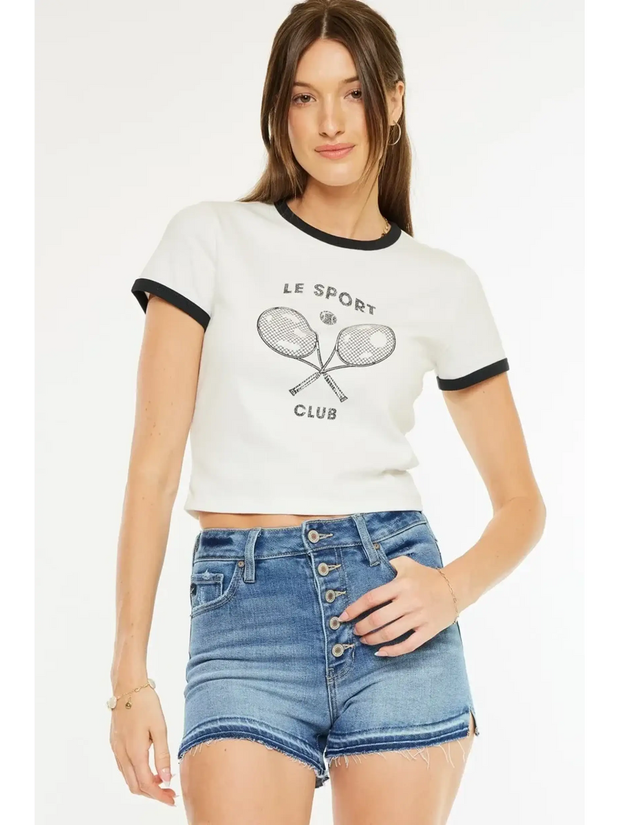 Trendsi kancan button fly cutoff shorts in blue denim worn by woman with white graphic crop top