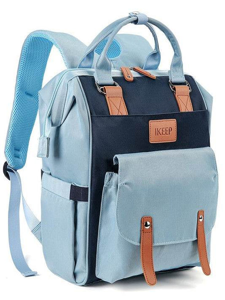 Babe Beachwear Himawari Crazy Pocket Backpack in blue with multiple pockets and brown leather accents