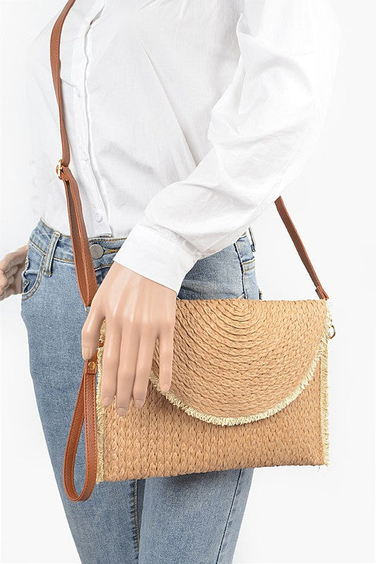 Babe Beachwear khaki convertible straw purse worn crossbody with adjustable brown strap