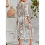 Babe Beachwear white lace belted beach cover up with floral embroidery and sheer design
