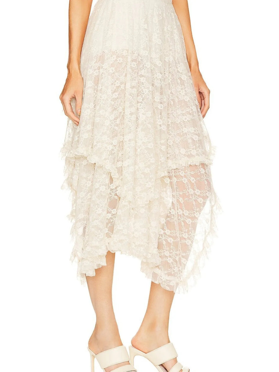 Babe Beachwear lace sheer summer vacation dress midi length with floral pattern and asymmetrical hem front side view