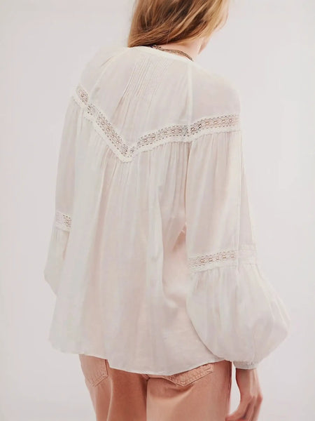 Babe Beachwear long sleeve lace trimmed beach blouse in white with delicate lace accents