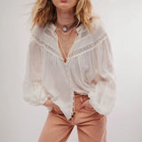 White lace trimmed beach blouse long sleeve from Babe Beachwaer with delicate lace details and button front