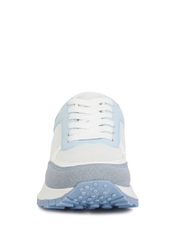 Front view of Babe Beachwear lace up vacation sneakers for women in white and light blue