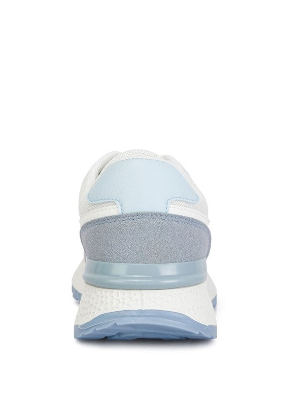 Babe Beachwear lace up vacation sneakers for women in white and light blue viewed from the back