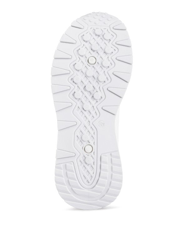 White sole of Babe Beachwear lace up vacation sneakers for women with textured grip and tread pattern