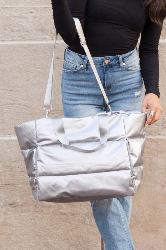 Silver large lightweight puffer weekends bag by Babe Beachwear with adjustable strap and spacious design