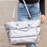 Silver large lightweight puffer weekends bag by Babe Beachwear with adjustable strap and spacious design