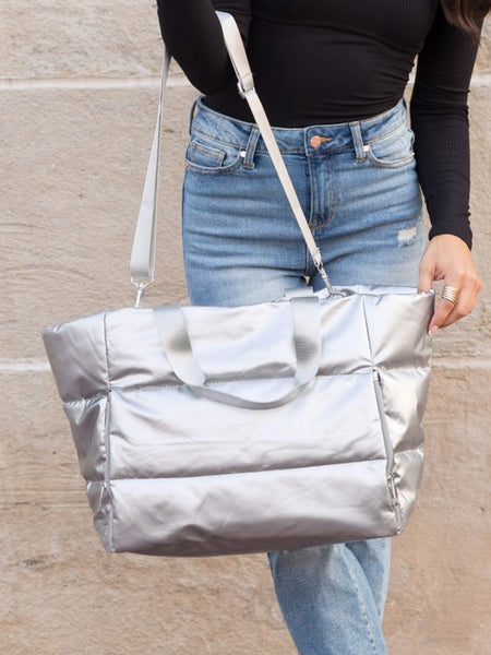 Silver large lightweight puffer weekends bag by Babe Beachwear with adjustable strap and spacious design