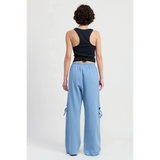 Emory Park laser cutout cotton beach pants wide leg in light blue worn by model from back