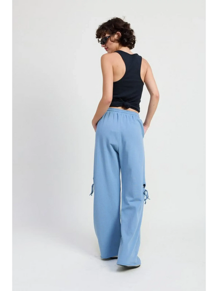 Emory Park wide leg laser cutout cotton beach pants in light blue worn with black tank top