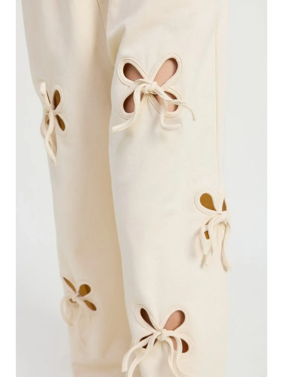 Emory Park wide leg laser cutout cotton beach pants with decorative floral cutouts and ties