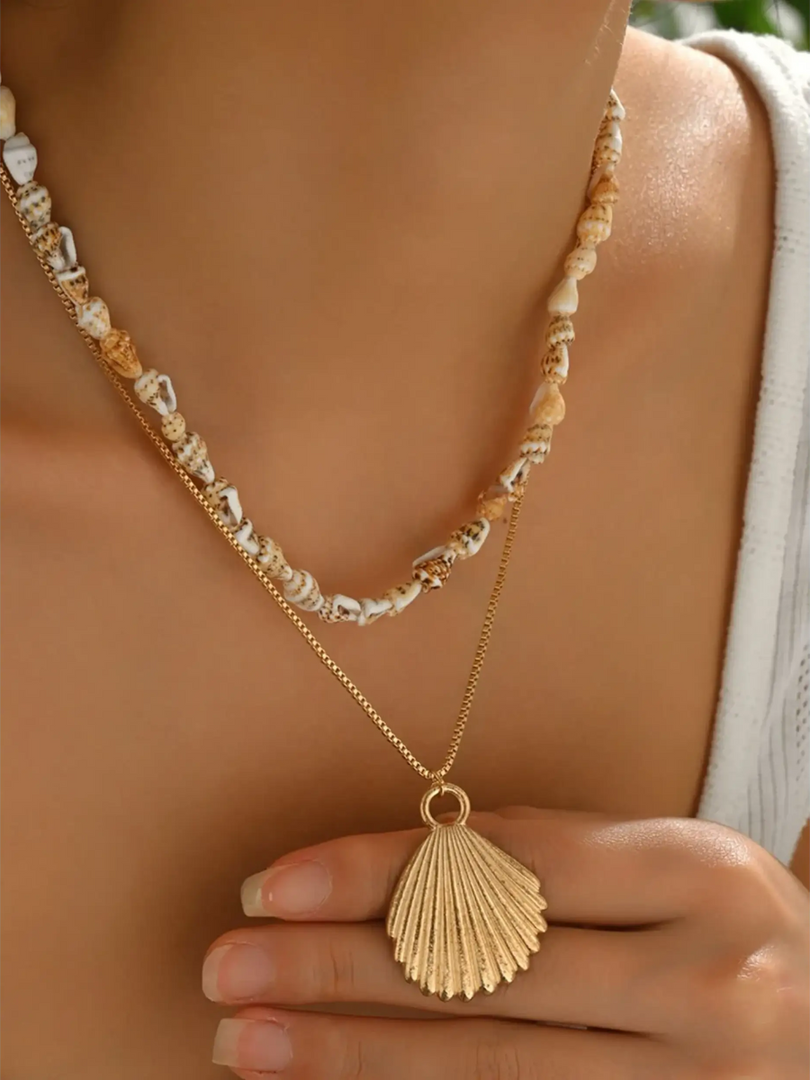 Trendsi Layered Shell Necklace featuring gold shell pendant and natural shell beads on layered chains