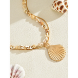 Trendsi Layered Shell Necklace featuring small seashell beads and a gold shell pendant