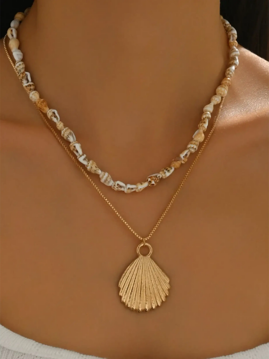 Trendsi Layered Shell Necklace featuring small natural shells and gold seashell pendant on two chains