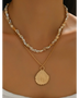 Trendsi Layered Shell Necklace featuring small natural shells and gold seashell pendant on two chains