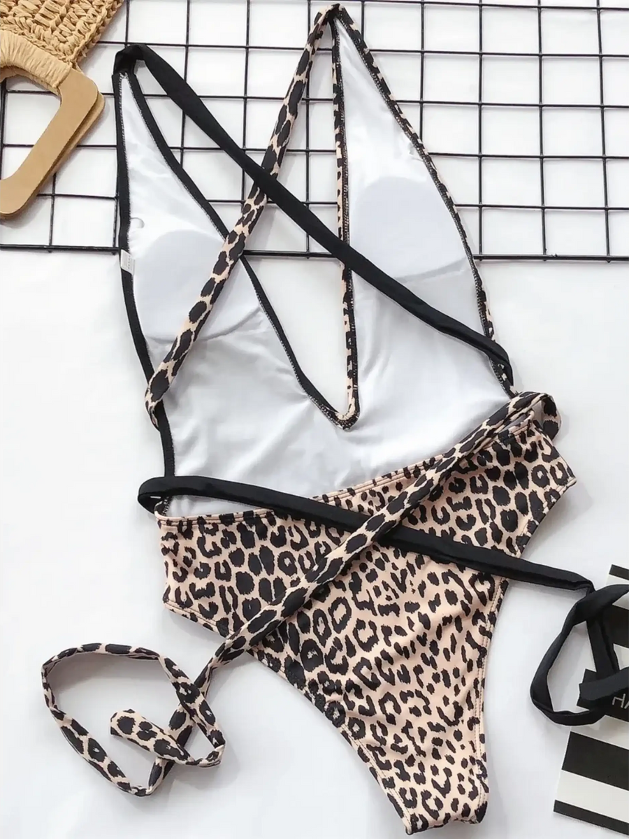 Beach Babes leopard print swimsuit for women with thin adjustable straps and black accents