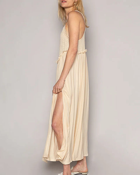 Trendsi lightweight beach party dress beige midi with side slit and spaghetti straps on model