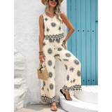 Babe Beachwear pants set featuring a sleeveless top and wide-leg pants with black patterns, perfect lightweight casual beach outfit