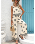 Babe Beachwear pants set featuring a sleeveless top and wide-leg pants with black patterns, perfect lightweight casual beach outfit