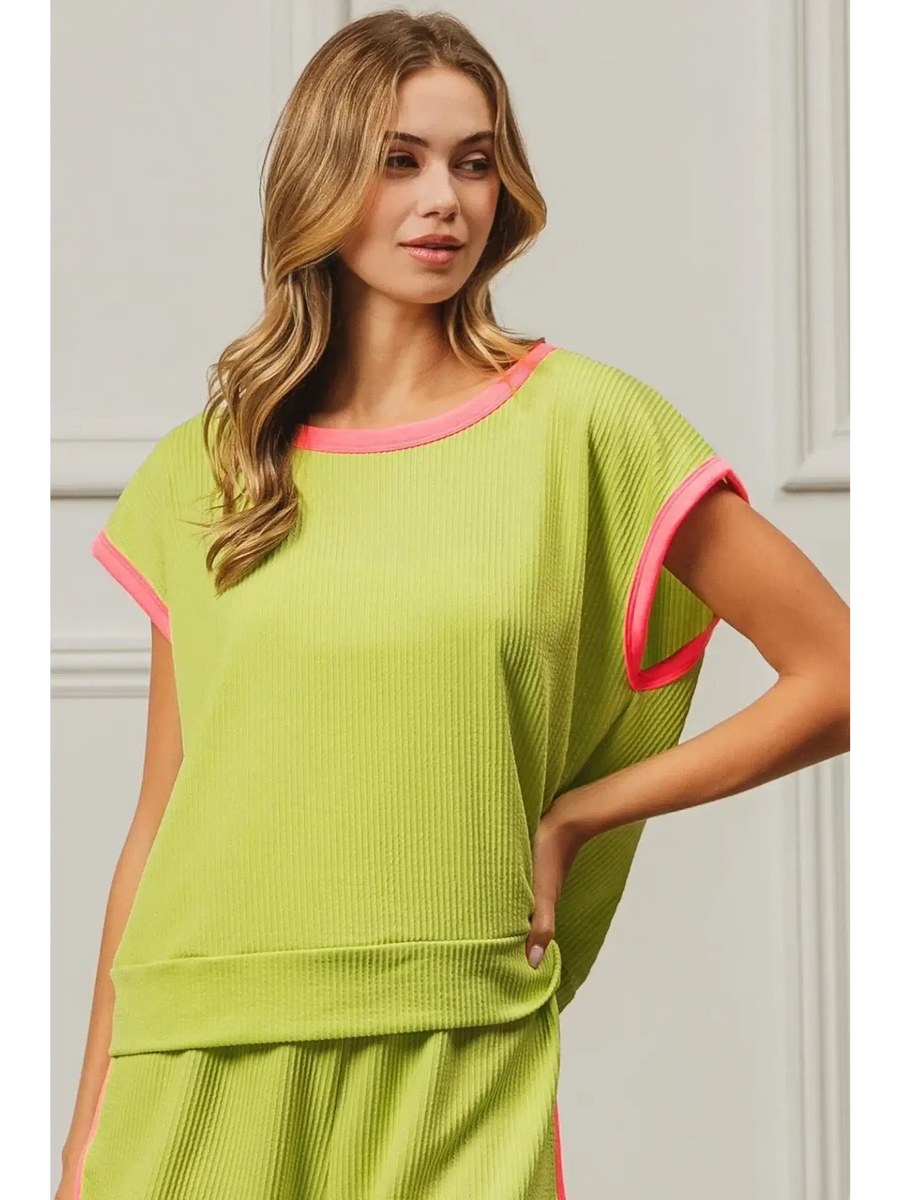 Trendsi lime and pink sleeveless shirt with ribbed texture and relaxed fit on female model