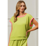 Trendsi lime and pink sleeveless shirt with ribbed texture and relaxed fit on female model