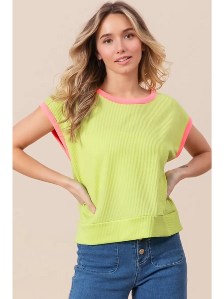 Trendsi lime and pink sleeveless shirt with ribbed texture and contrasting trim on model