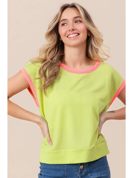 Trendsi lime and pink sleeveless shirt with ribbed texture worn by smiling woman